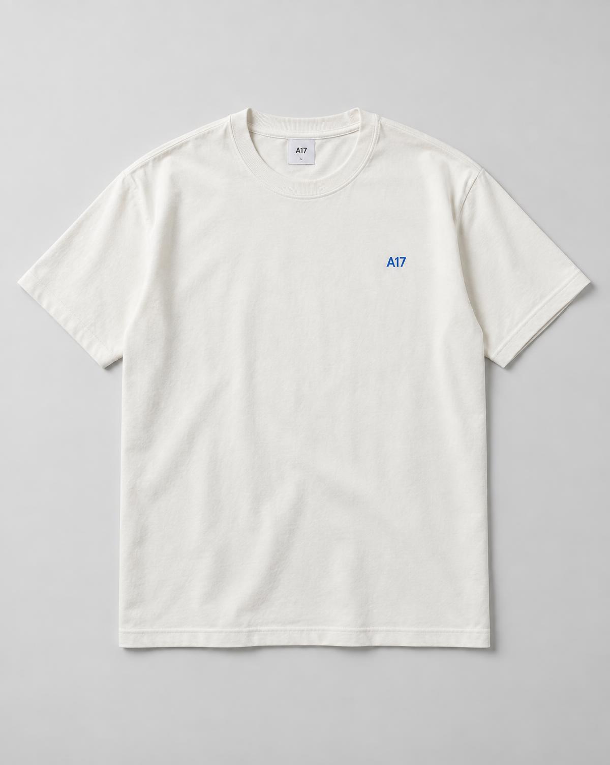 A17 essential tee in off-white with a blue chest print